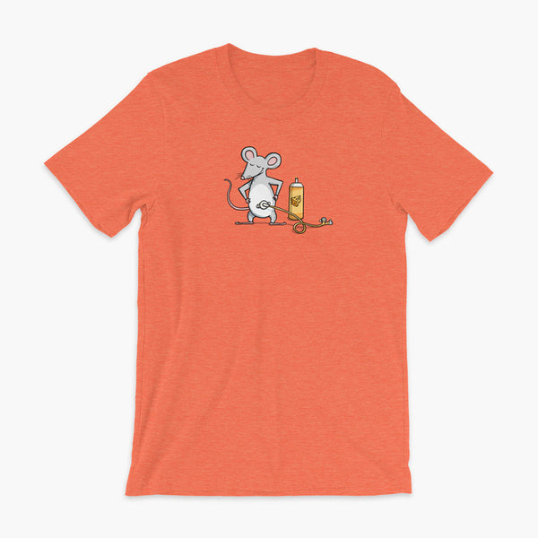 A mouse with a Mic-Key button and a g-tube extension confidently standing in front of a bottle of cheese or whiz with cheese in the g-tube on a heather orange adult t-shirt