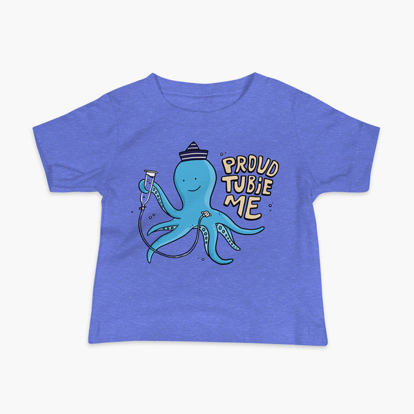 An octopus with a g-tube or gastronomy tube holding a feeding syringe doing a gravity feed in the ocean or underwater using his FreeArm feeding assistant with a stoma on a heather columbia blue infant t-shirt