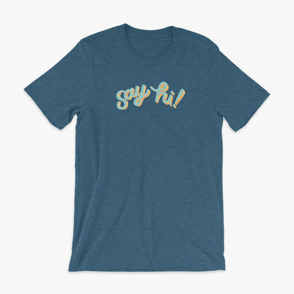 Floating say hi! script text on a heather teal adult t-shirt