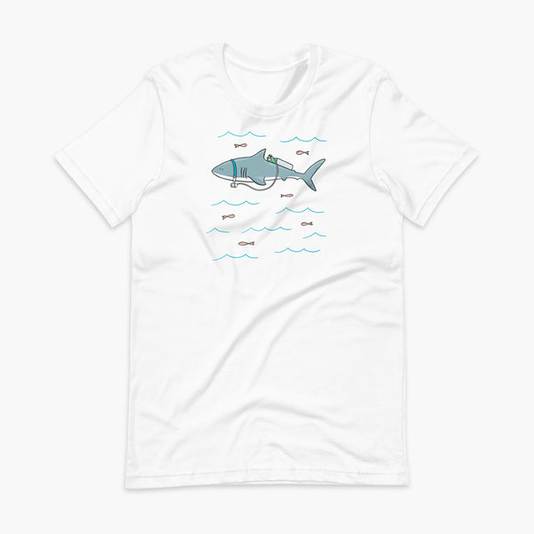 A Great White Shark with a trach or tracheostomy and tubing that goes to an oxygen or 02 tank on his back. swimming in the ocean with fish on a white adult t-shirt