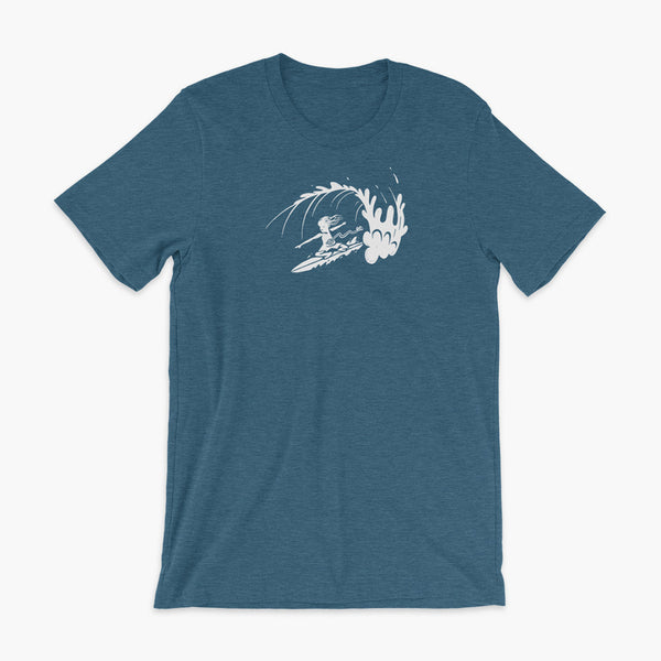 A white block print style illustration of a young kid surfing in a wave, getting tubed or barreled and he has a g-tube flowing from his stomach as he flies down the line on a heather deep teal adult t-shirt