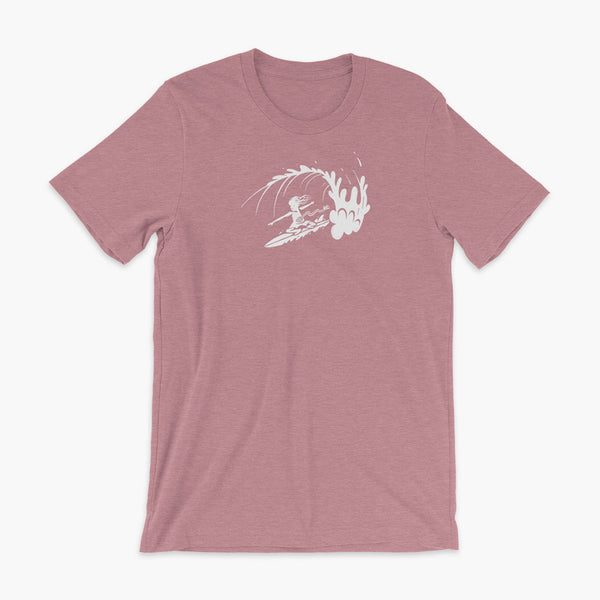 A white block print style illustration of a young kid surfing in a wave, getting tubed or barreled and he has a g-tube flowing from his stomach as he flies down the line on a heather orchid adult t-shirt