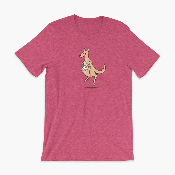 A happy orange tube kangaroo hops along with her Joey feeding pump and feeding tube sitting in her pouch with a g-tube on a heather raspberry adult t-shirt