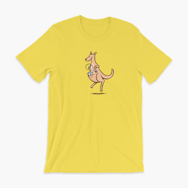 A happy orange tube kangaroo hops along with her Joey feeding pump and feeding tube sitting in her pouch with a g-tube on a yellow adult t-shirt