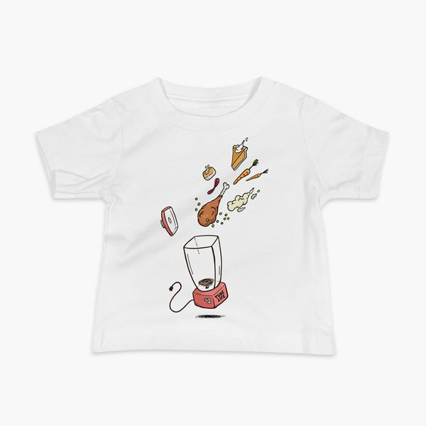 A Thanksgiving dinner getting thrown into a blender - a turkey leg, mashed potatoes, carrots, pumpkin pie and bread on a white infant t-shirt. A meal for those who are living the Tube Life with a Stoma.