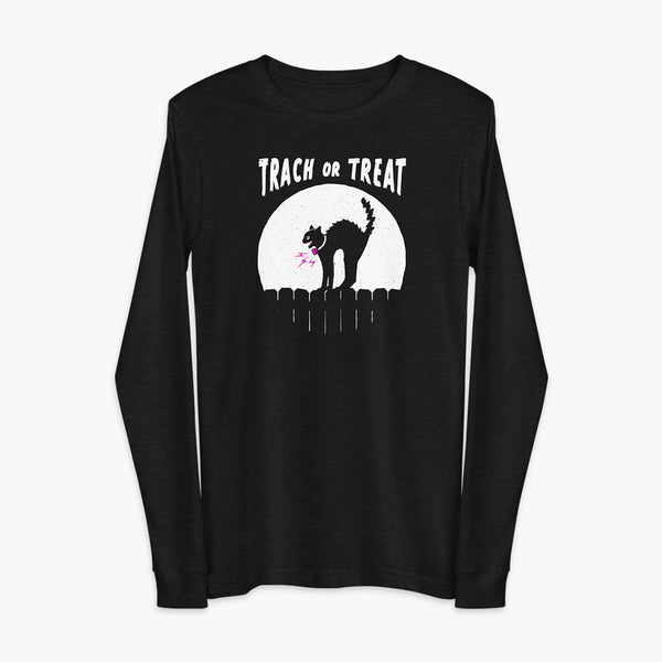 A white cat with a trach or tracheostomy and a PMV or Passy Muir valve with the word "TRACH OR TREAT" in white letter across the chest. The black cat is standing on top of a fence, silhouetted by the moon for Halloween. It is on a black heather black adult long sleeve shirt.