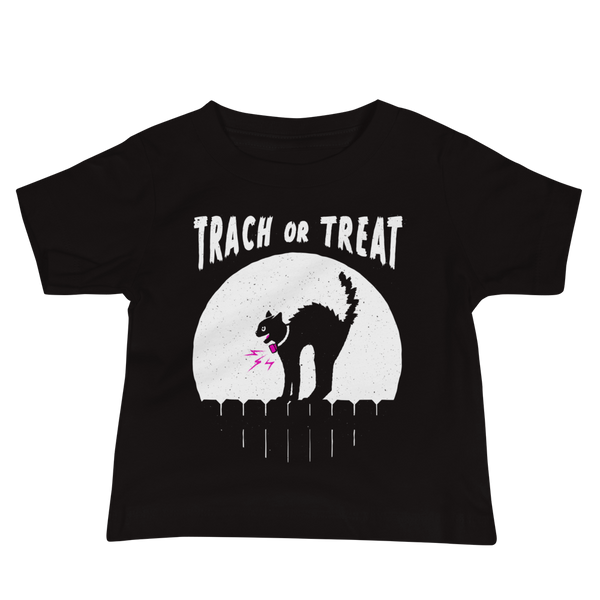 A white cat with a trach or tracheostomy and a PMV or Passy Muir valve with the word "TRACH OR TREAT" in white letter across the chest. The black cat is standing on top of a fence, silhouetted by the moon for Halloween. It is on a black infant sleeve shirt.