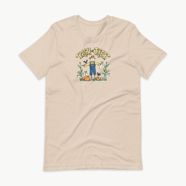 Trach or Treat Halloween t-shirt in soft cream with scarecrow and oxygen tank design for tracheostomy families