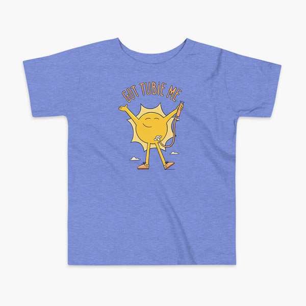 A happy sun stands confidently in tennis shoes holding a g-tube or a gastronomy tube with a stoma for StomaStoma with the text Got Tubie Me above him on a kids heather blue t-shirt 