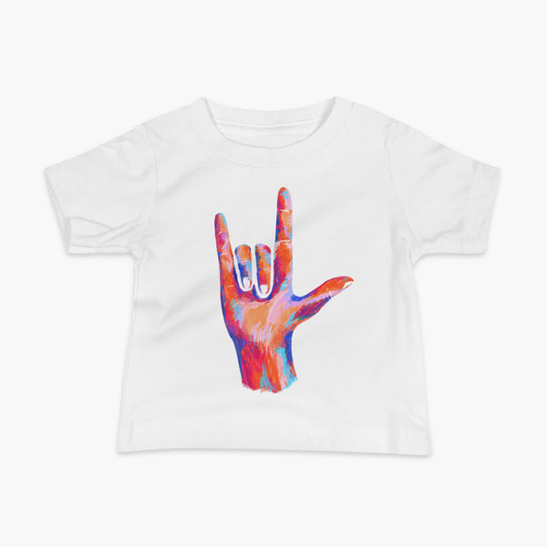 A big colorful hand signing I Love You on a white infant t-shirt.