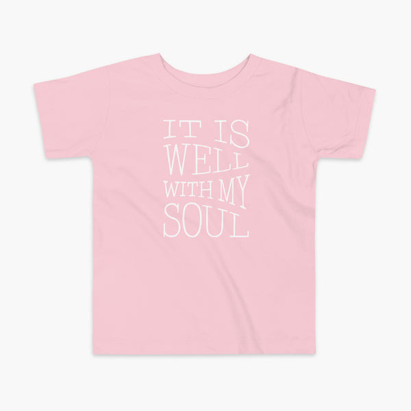 The lyrics from a hymn penned by Horatio Spafford written in a waves river like design on a pink kids t-shirt