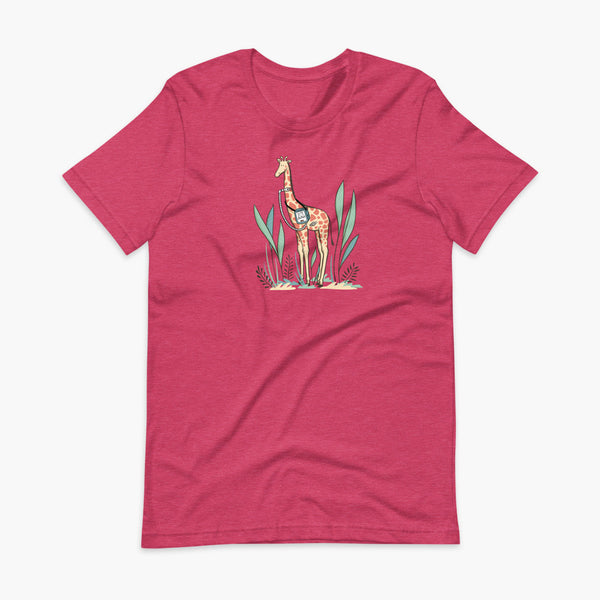 A giraffe with a trach or tracheostomy and a ventilator and g-tube mic-key button standing in a shrubbery with a stoma on a heather raspberry adult t-shirt