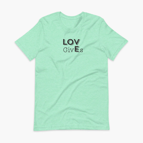 The word Love has given its “E” to the the word Gives. So it says Lov givEs on a heather mint adult t-shirt.