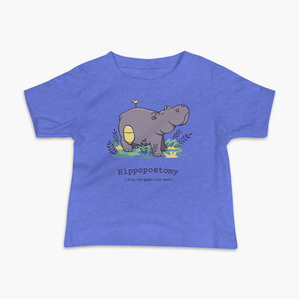 A Hippo or Hippopotamus with an ostomy bag — also known as a Hippopostomy. He is standing in some foliage smiling and has a bird on his back on a blue infant t-shirt.