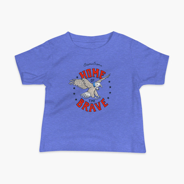 A patriotic American bald eagle with a trach or tracheostomy for the 4th of July and the words StomaStoma Home of the Brave and stars on a blue infant t-shirt