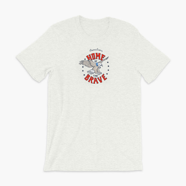 A patriotic American bald eagle with a trach or tracheostomy for the 4th of July and the words StomaStoma Home of the Brave and stars on an ash adult t-shirt