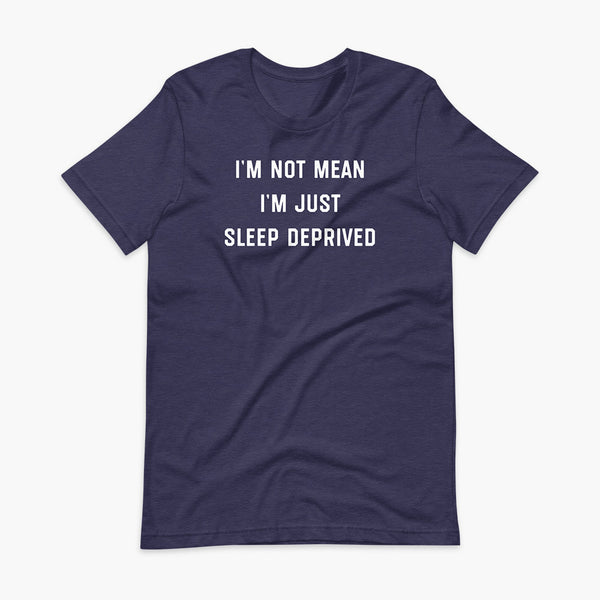 Stacked white text that says I’m Not Mean I’m Just Sleep Deprived  - for living the tired tracheostomy, tubie or trach life with a stoma on a heather midnight navy adult t-shirt 