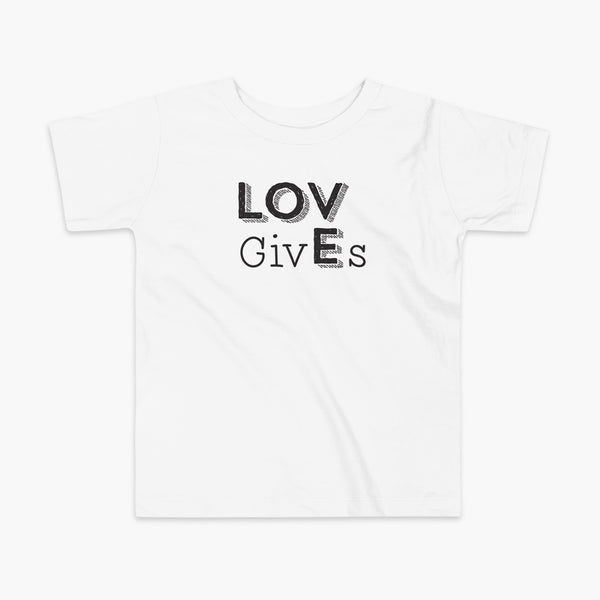 The word Love has given its “E” to the the word Gives. So it says Lov givEs on a white kids t-shirt.
