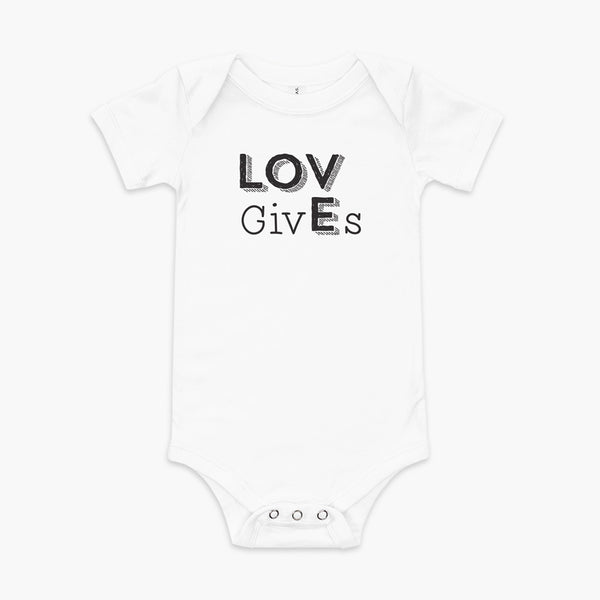 The word Love has given its “E” to the the word Gives. So it says Lov givEs on a white infant onesie.