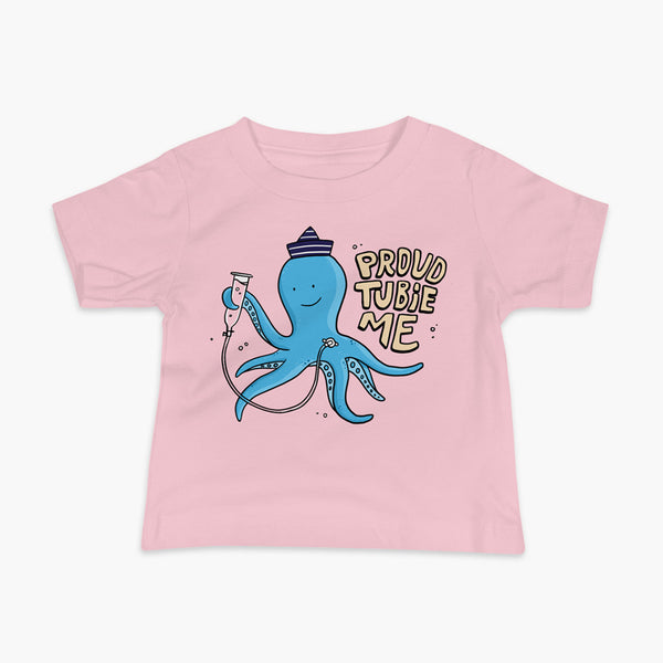 An octopus with a g-tube or gastronomy tube holding a feeding syringe doing a gravity feed in the ocean or underwater using his FreeArm feeding assistant with a stoma on a pink infant t-shirt