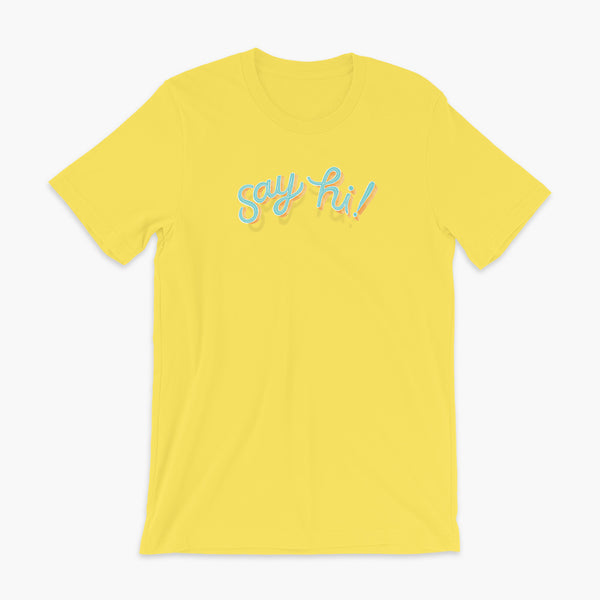 Floating say hi! script text on a yellow adult t-shirt