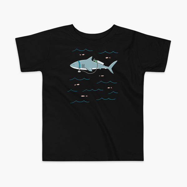 A Great White Shark with a trach or tracheostomy and tubing that goes to an oxygen or 02 tank on his back. swimming in the ocean with fish on a black kids t-shirt
