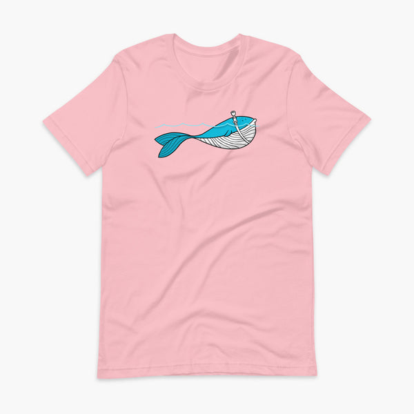A blue whale with a trach or tracheostomy over his blow hole is happy and swimming in the water or ocean while living the trach life with his stoma on an adult pink t-shirt