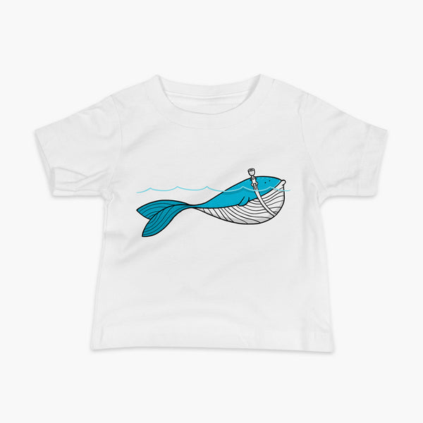 A blue whale with a trach or tracheostomy over his blow hole is happy and swimming in the water or ocean while living the trach life with his stoma on an infant white t-shirt