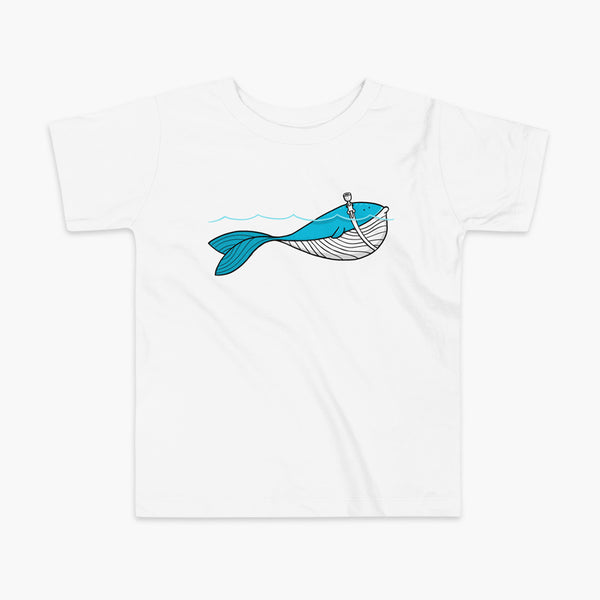 A blue whale with a trach or tracheostomy over his blow hole is happy and swimming in the water or ocean while living the trach life with his stoma on a kids white t-shirt
