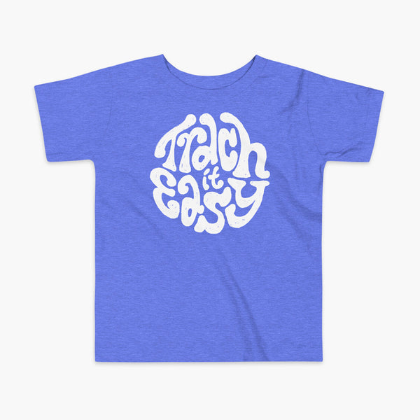 White text that says Trach It Easy for living the tracheostomy life with StomaStoma on a heather blue kids t-shirt