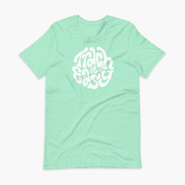White text that says Trach It Easy for living the tracheostomy life with StomaStoma on a heather mint adult t-shirt 