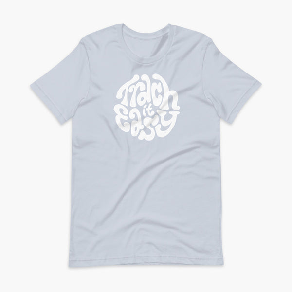 White text that says Trach It Easy for living the tracheostomy life with StomaStoma on a light blue adult t-shirt 