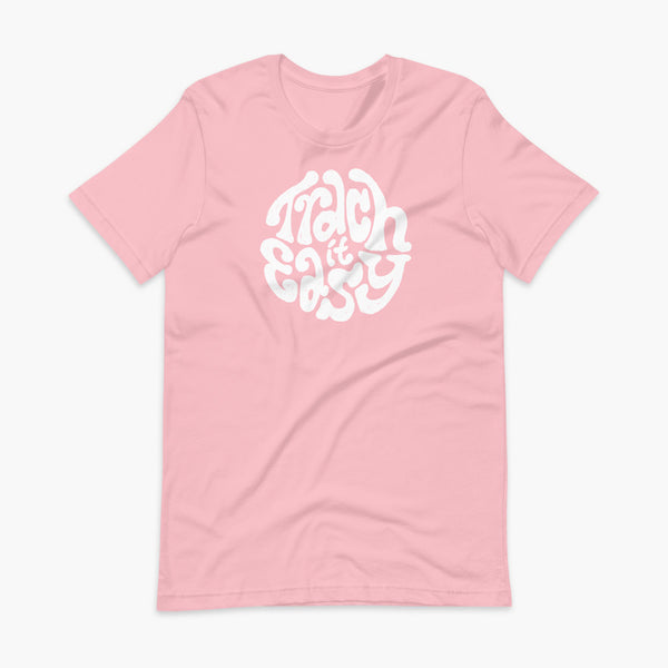 White text that says Trach It Easy for living the tracheostomy life with StomaStoma on a pink adult t-shirt 