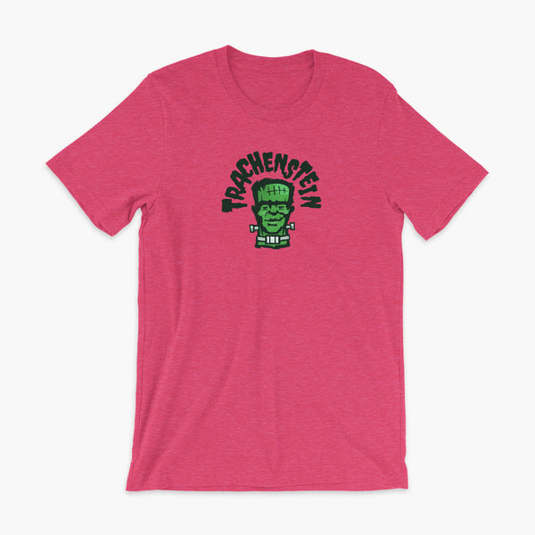 A Frankenstein with a trach or tracheostomy is called a Trachenstein! He has bolts in his neck and an HME on trach in his stoma. On a heather raspberry adult t-shirt