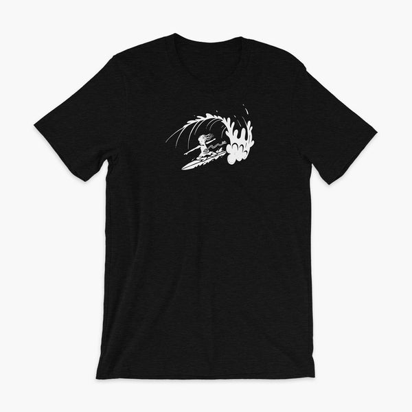 A white block print style illustration of a young kid surfing in a wave, getting tubed or barreled and he has a g-tube flowing from his stomach as he flies down the line on a heather black adult t-shirt