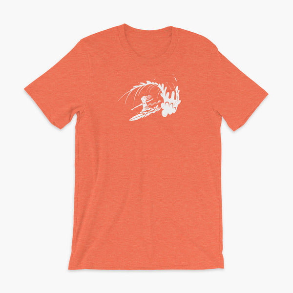 A white block print style illustration of a young kid surfing in a wave, getting tubed or barreled and he has a g-tube flowing from his stomach as he flies down the line on a heather orange adult t-shirt