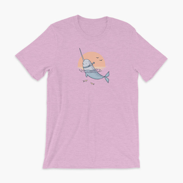 A Narwhal that has a trach or tracheostomy pokes his head and horn through the water in front of a setting sun. He has a naturally built in stoma. It is on a heather prism lilac adult t-shirt.