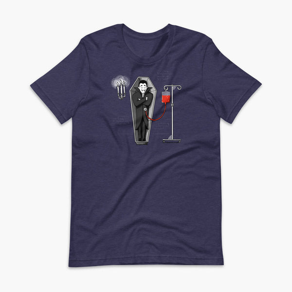 A halloween vampire is sleeping in a coffin in his castle and eating blood through a drip blood bag directly into his g-tube or gastronomy tube and g-tube mic-key a heather midnight navy  adult t-shirt