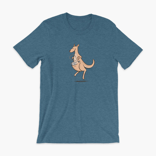 A happy orange tube kangaroo hops along with her Joey feeding pump and feeding tube sitting in her pouch with a g-tube on a deep heather teal adult t-shirt