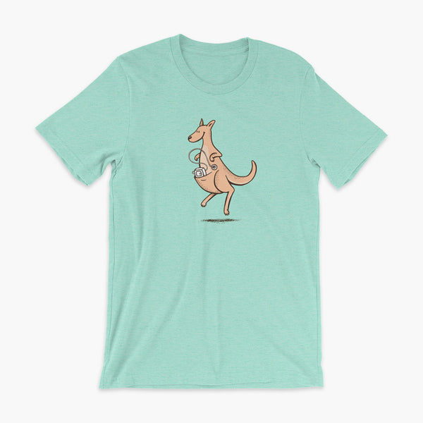 A happy orange tube kangaroo hops along with her Joey feeding pump and feeding tube sitting in her pouch with a g-tube on a heather mint adult t-shirt