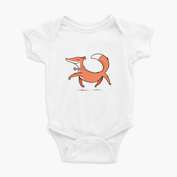 A confident orange and white fox with a trach or tracheostomy an HME for humidification trots on a white infant onesie
