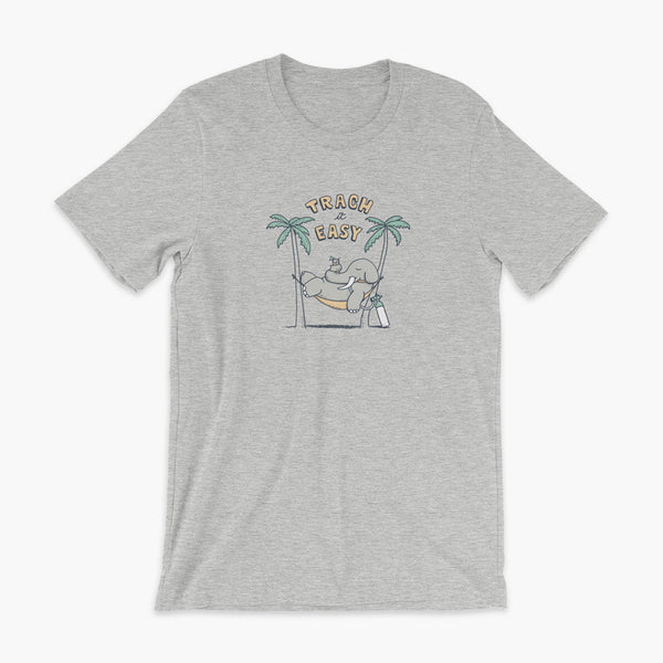 An elephant with a trach or tracheostomy and connected to an oxygen tank sits in a hammock between two palm trees with his nose around a drink just trachin’ it easy and relaxing on a athletic heather adult t-shirt