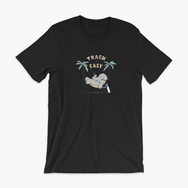 An elephant with a trach or tracheostomy and connected to an oxygen tank sits in a hammock between two palm trees with his nose around a drink just trachin’ it easy and relaxing on a black adult t-shirt
