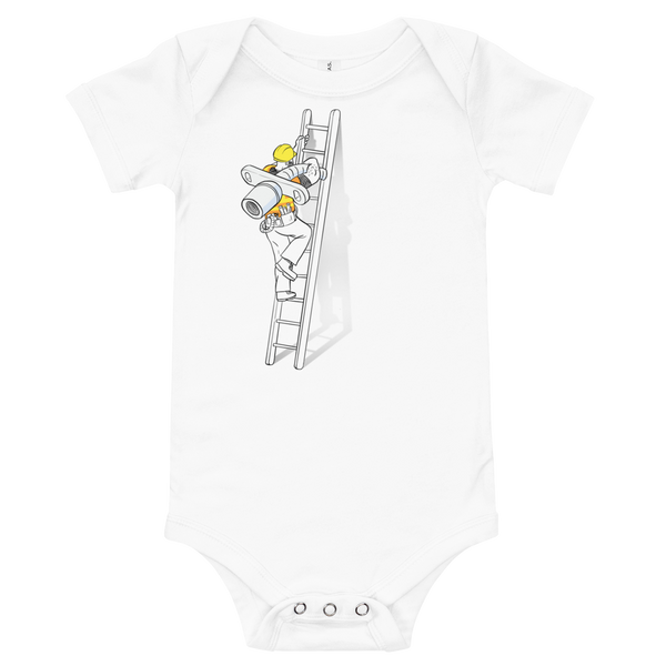 A construction worker is climbing a ladder with a trach to do a trach change on a white infant onesie.
