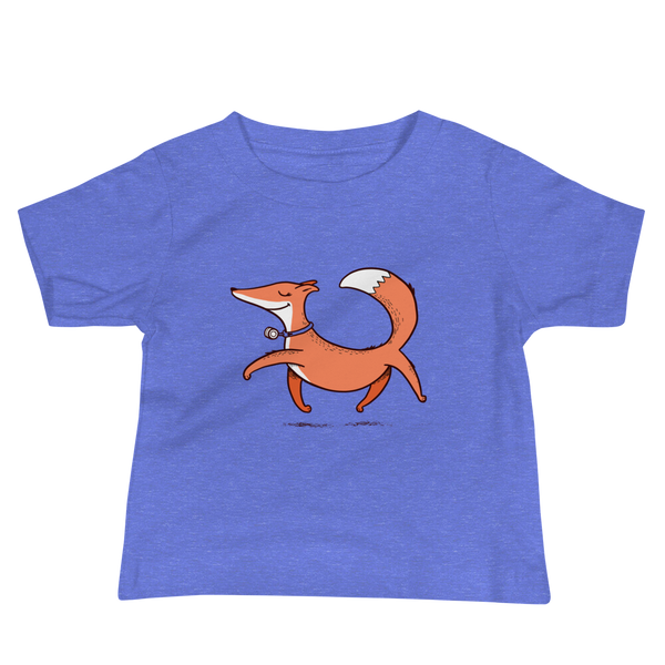 A confident orange and white fox with a trach or tracheostomy and HME for humidification via stoma trots on a heather columbia blue infant t-shirt.