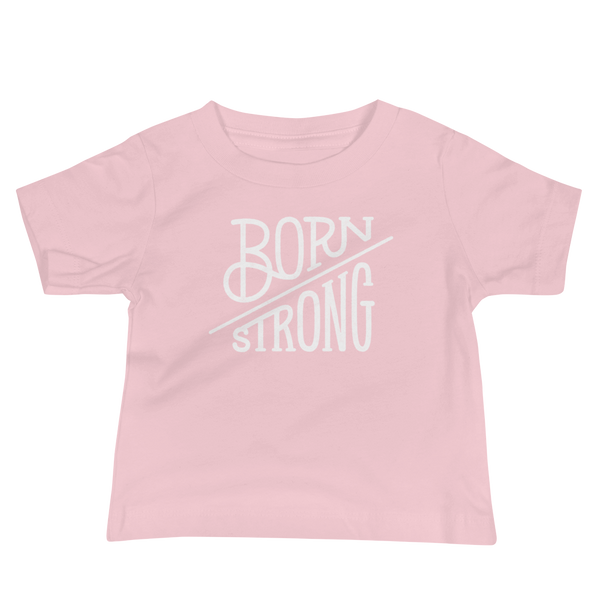 The text Born Strong on an Infant pink T-Shirt  by StomaStoma for g-tube and trach life empowerment.