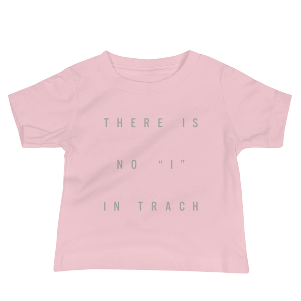 The words There is no ”I“ in Trach for Trach Empowerment on a pink infant t-shirt