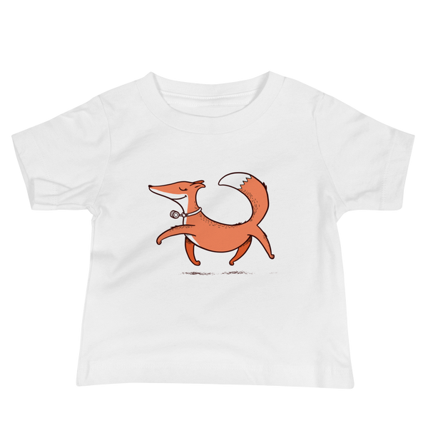 A confident orange and white fox with a trach or tracheostomy and HME for humidification via stoma trots on a white infant t-shirt.