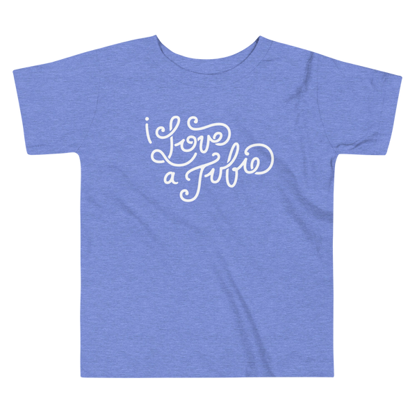 White Hand-drawn script or lettering that says I love a tubie on a  heather columbia blue kids t-shirt for the g-tube or stoma.