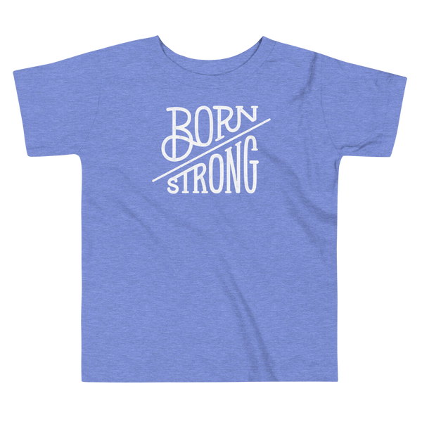 The text Born Strong on a kids heather blue  T-Shirt  by StomaStoma for g-tube and trach life empowerment.
